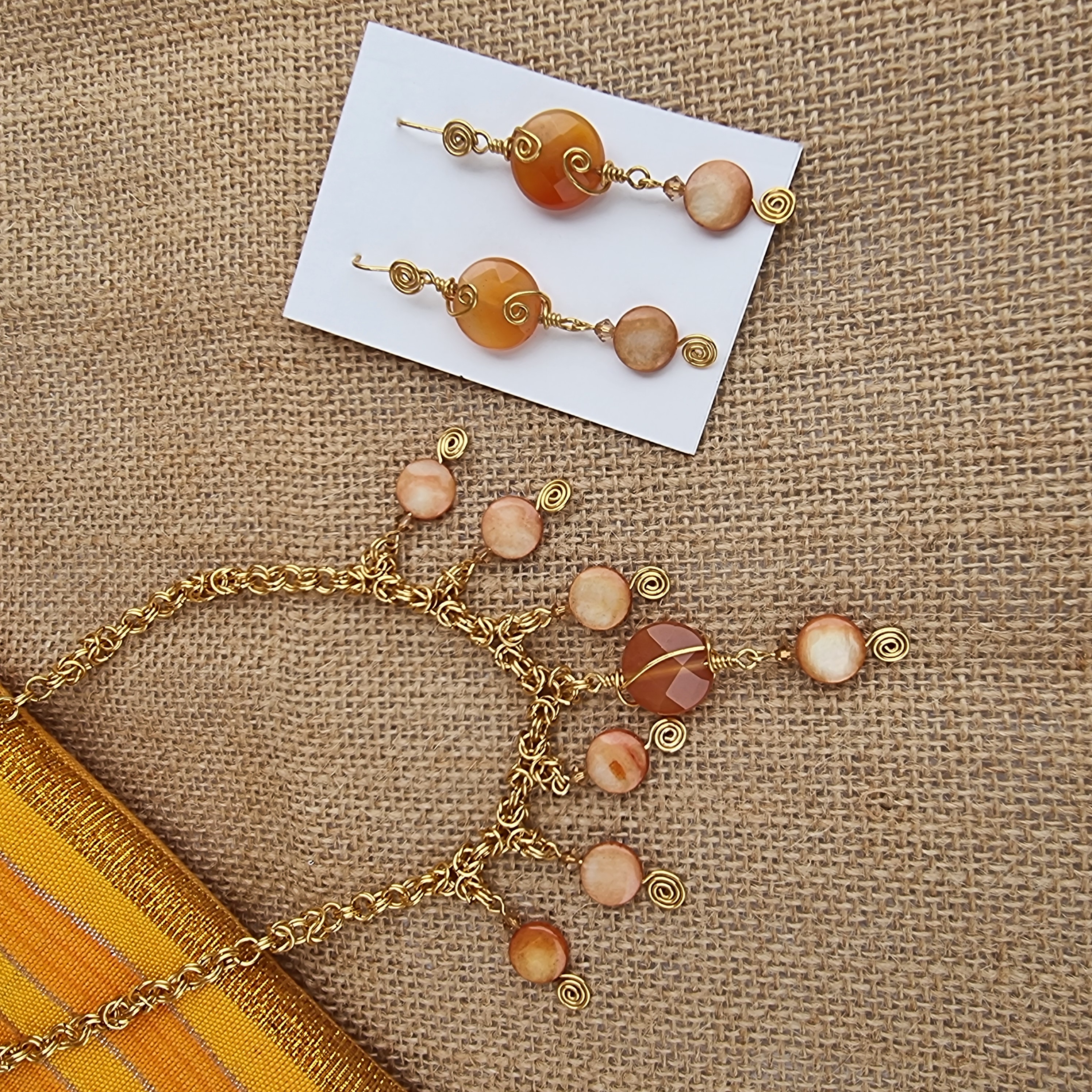 Handcrafted necklace and earrings from gold-plated wire with Mother of Pearl and agate beads - Anne Lawal Jewellry