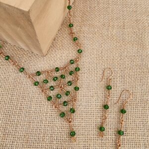 Handcrafted copper necklace and earrings with wire wrapped links and crystals.  Anne Lawal Jewellry