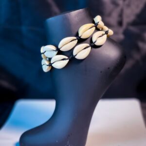 Rawcraft's adjustable cowrie anklet made with ceramic cowries