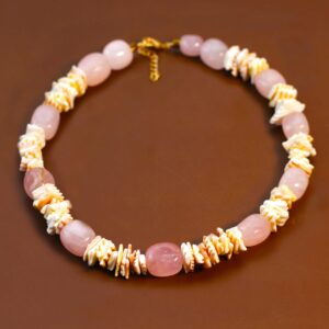 Rawcraft's Ola necklace made with rose quartz and shells